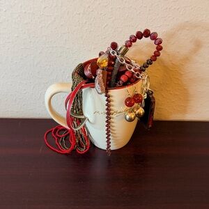 Mystery Jewelry Jar/mug overflowing w/ red & mixed metals